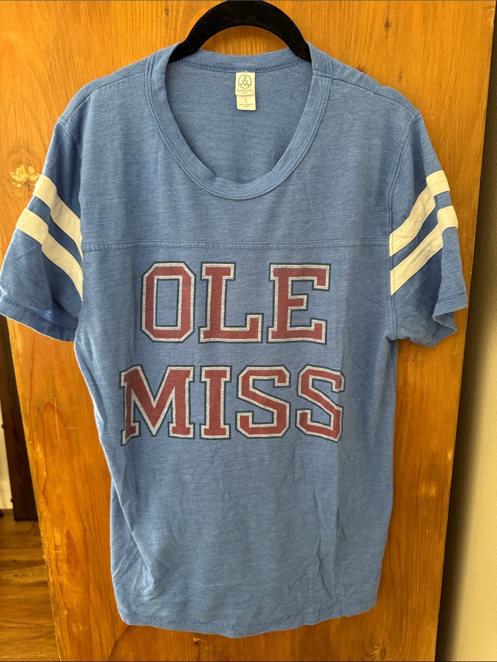 Alternative Light Blue 'OLE MISS' Short Sleeve Tee with White Sleeve Stripes